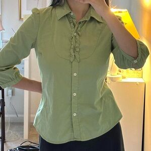 Light green button up ruffle blouse